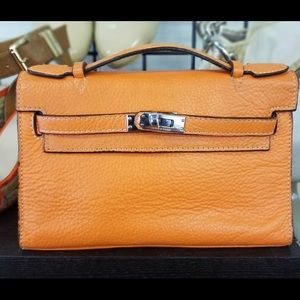 Orange kelly handbag